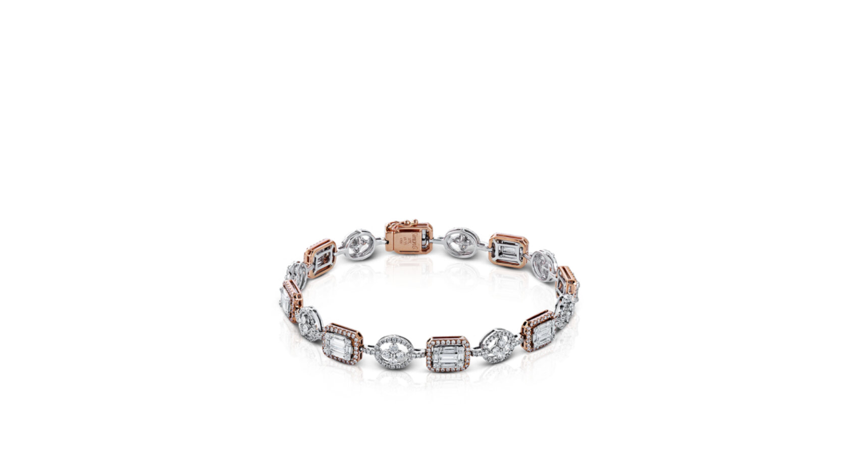 This gorgeous two-tone gold bracelet features a detailed design set with 2.67 ctw of round brilliant diamonds and 1.88 ctw of baguette diamonds