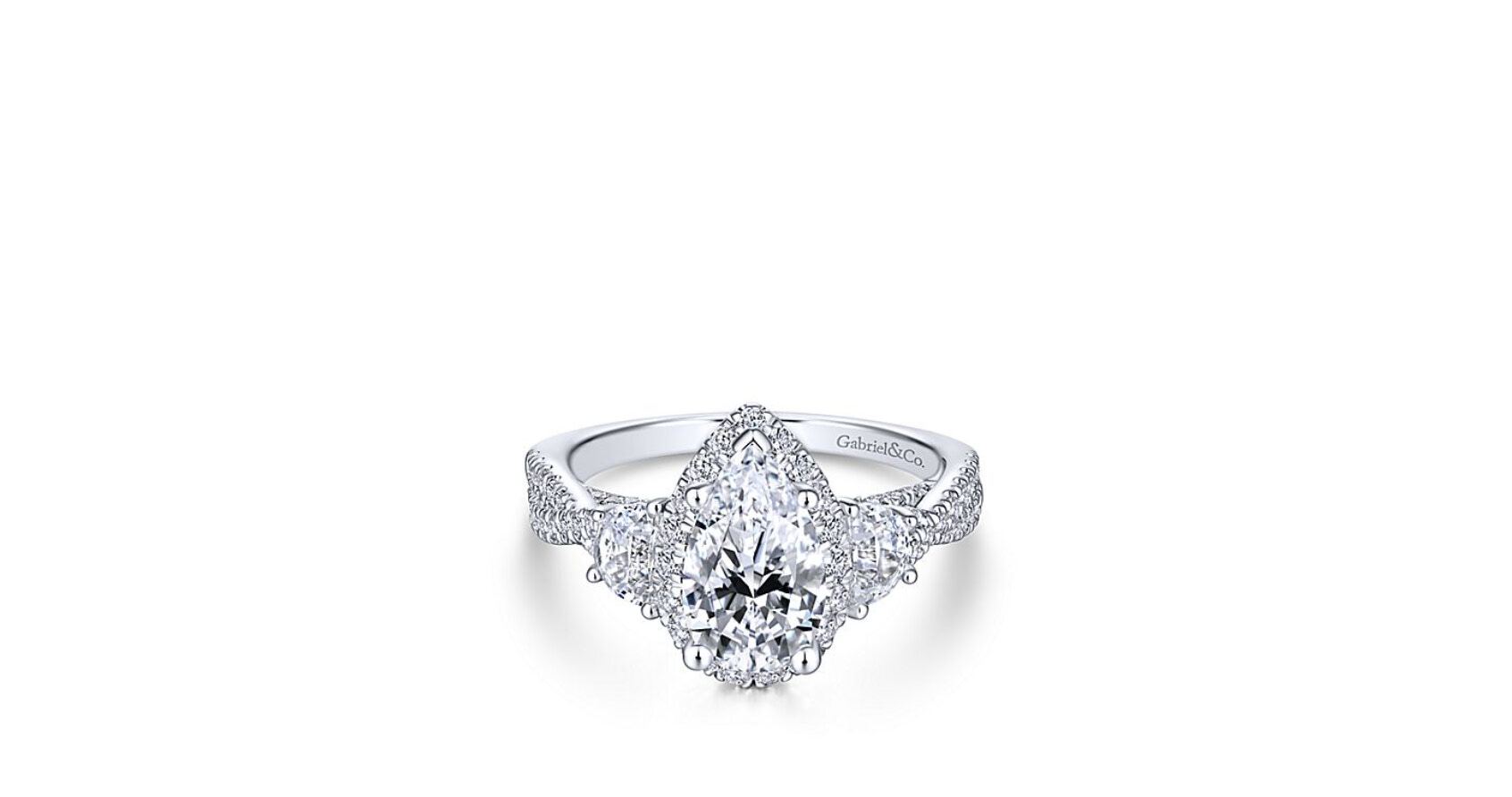 A twisted diamond band showcase a pear shaped center stone with matching side stones and a diamond halo to add extra  sparkle